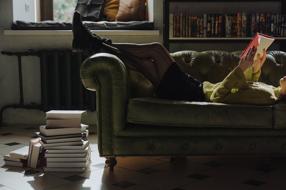 Image of a person studying with a laptop and books, representing continuous learning